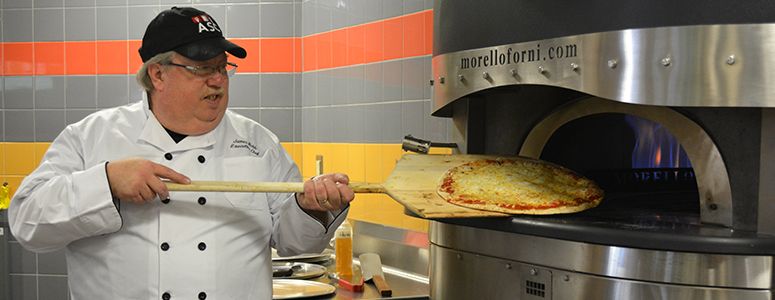 Pizza in oven at The Bistro